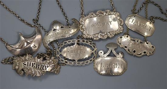 Three Georgian silver wine labels including one by The Barnards, three Victorian silver wine labels, one modern silver label etc.